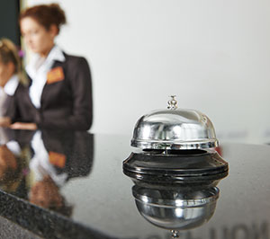 Bell on hotel front desk - Pest control services with City Termite & Pest Control in Malvern, AR